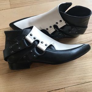 McQ Alexander McQueen booties with D-ring buckles.